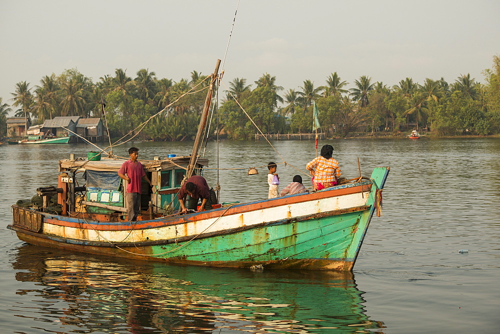 Dawn at Kampot Harbour as fishing boats return with night's catch, Kampot Province, Cambodia, Indochina, Southeast Asia, Asia 