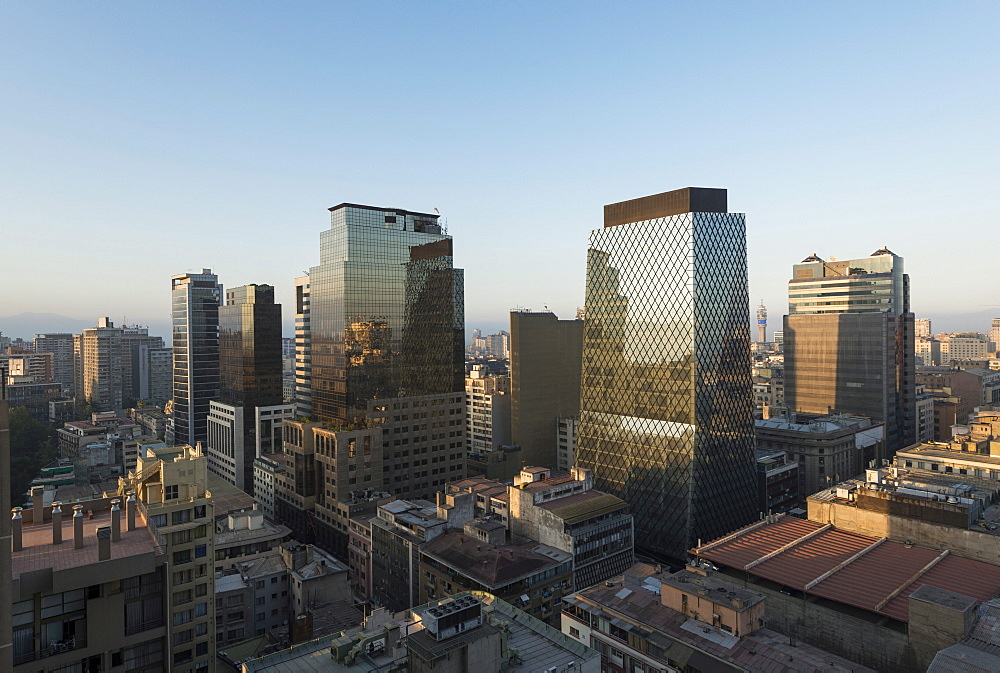 Aerial view of Central Santiago City at dawn from Apartment block rooftop, Calle Huerfanos, Santiago, Chile, South America