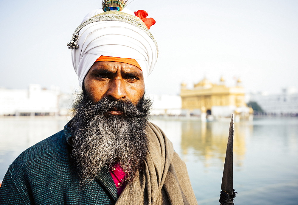 Portrait of Nihang Sikh man, Harmandir Sahib (Golden Temple), Amritsar, Punjab, India, Asia