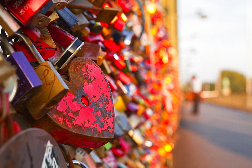 Love locks tied onto the railway bridge in Cologne, North Rhine-Westphalia, Germany, Europe 