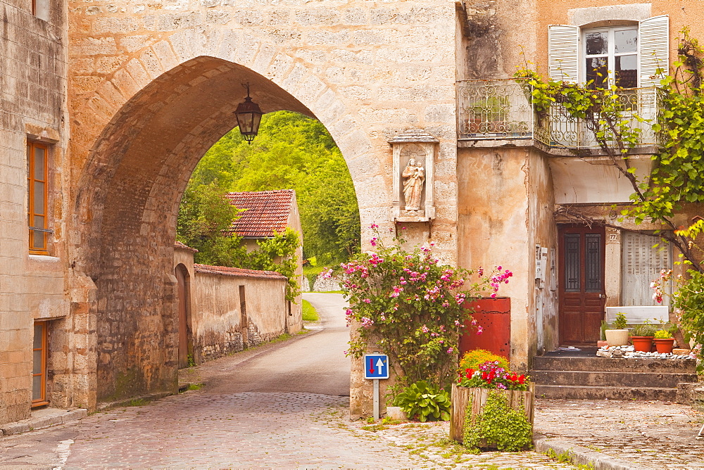 One of the old gates to the village of Noyers sur Serein in Yonne, Burgundy, France, Europe