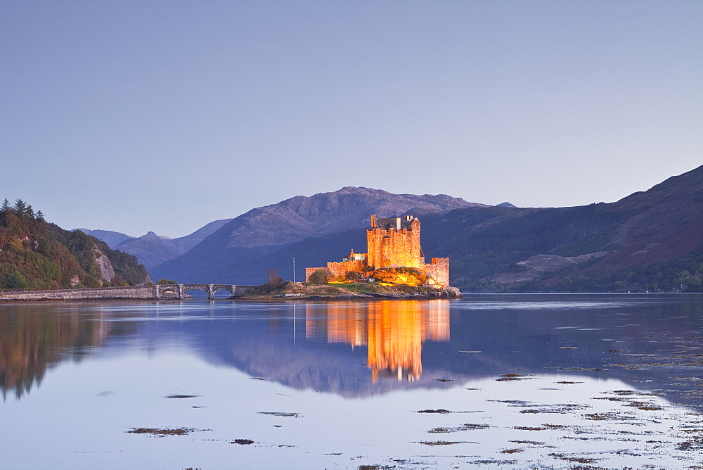 Eilean Donan castle reflecting in Loch Duich, Highlands, Scotland, United Kingdom, Europe