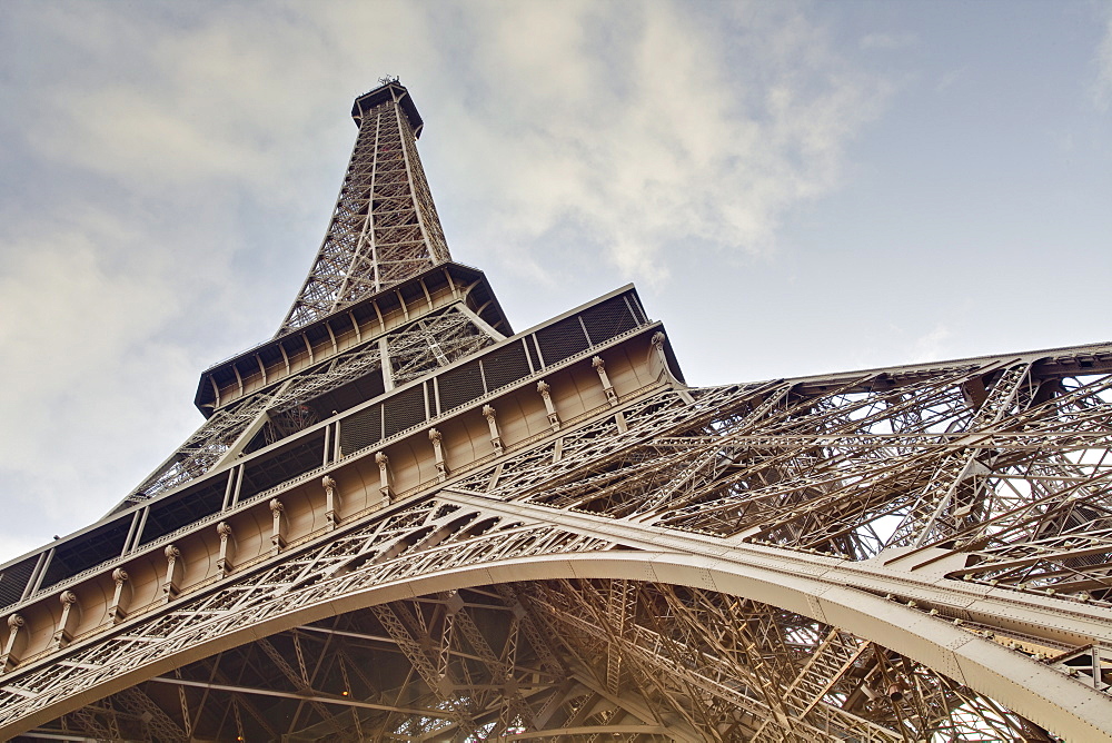 The Eiffel Tower towers overhead, Paris, France, Europe