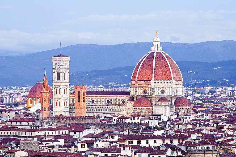 The view from Piazzale Michelangelo over to the historic city of Florence with the dome of Basilica di Santa Maria del Fiore (Duomo) lit up, Florence, UNESCO World Heritage Site, Tuscany, Italy, Europe 