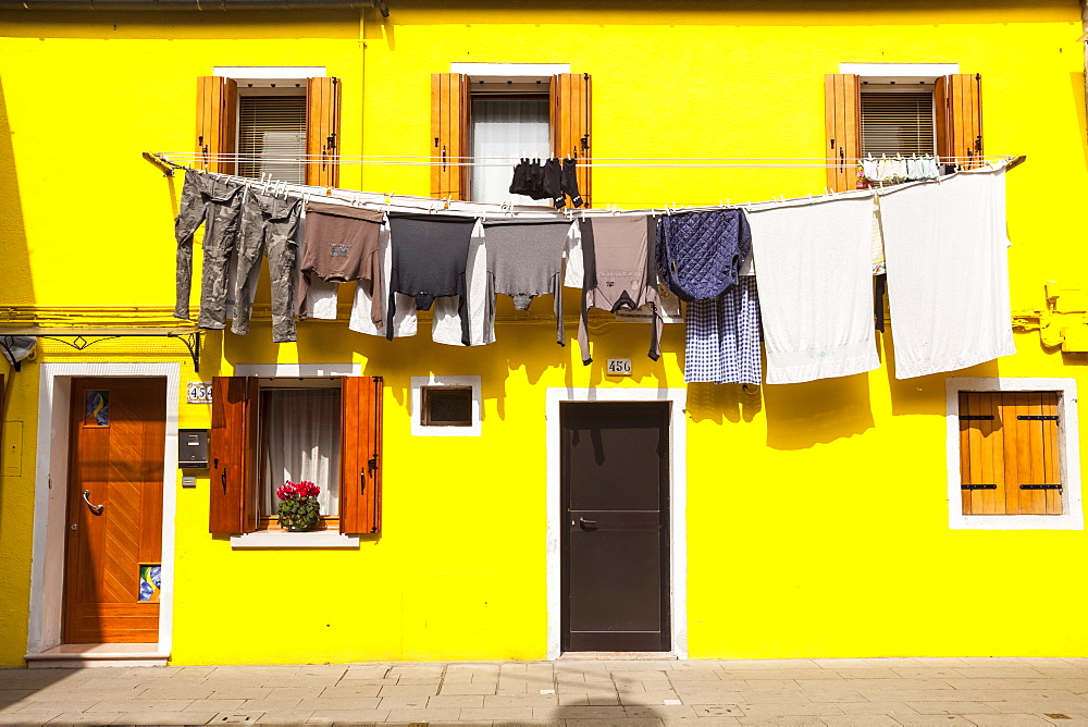 A colorful house on Burano, Venice, Veneto, Italy, Europe