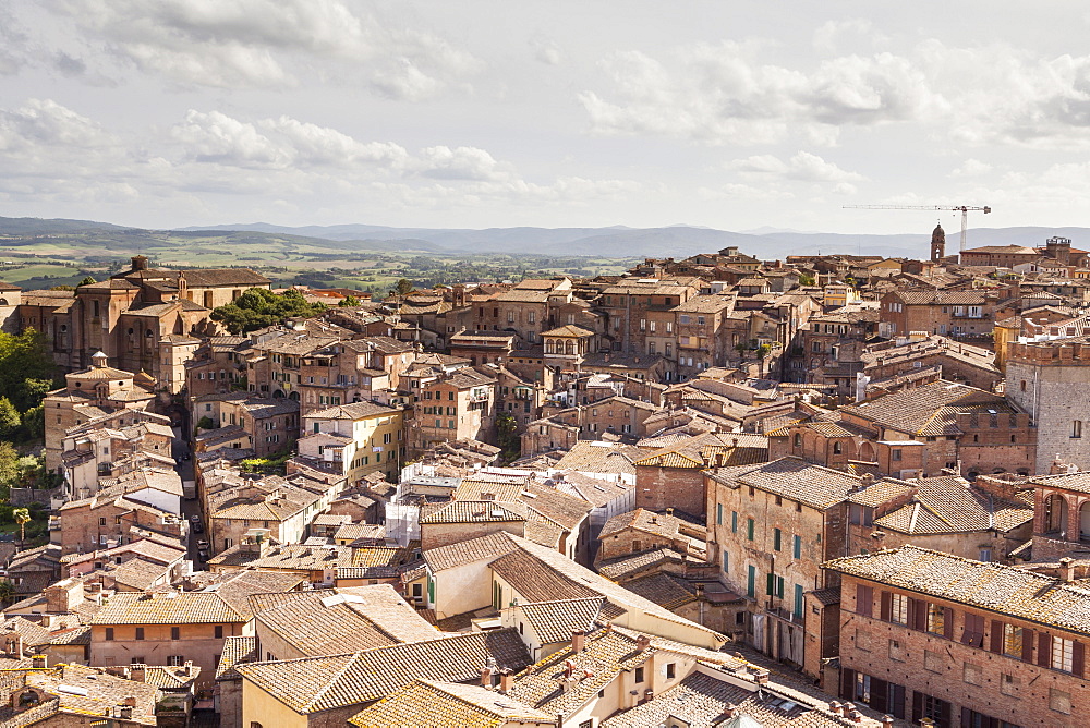 The view over the rooftops of Siena from Torre del Mangia, UNESCO World Heritage Site, Siena, Tuscany, Italy, Europe