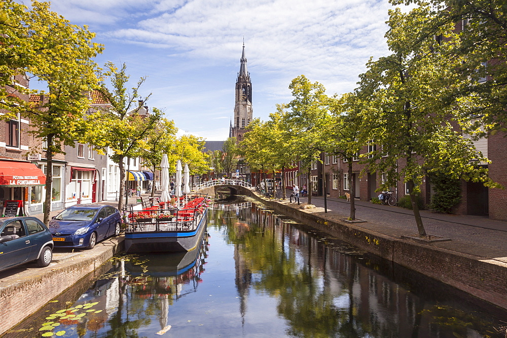 The historic centre of Delft, the Nieuwe Kerk church can be seen above the rooftops, Delft, The Netherlands, Europe