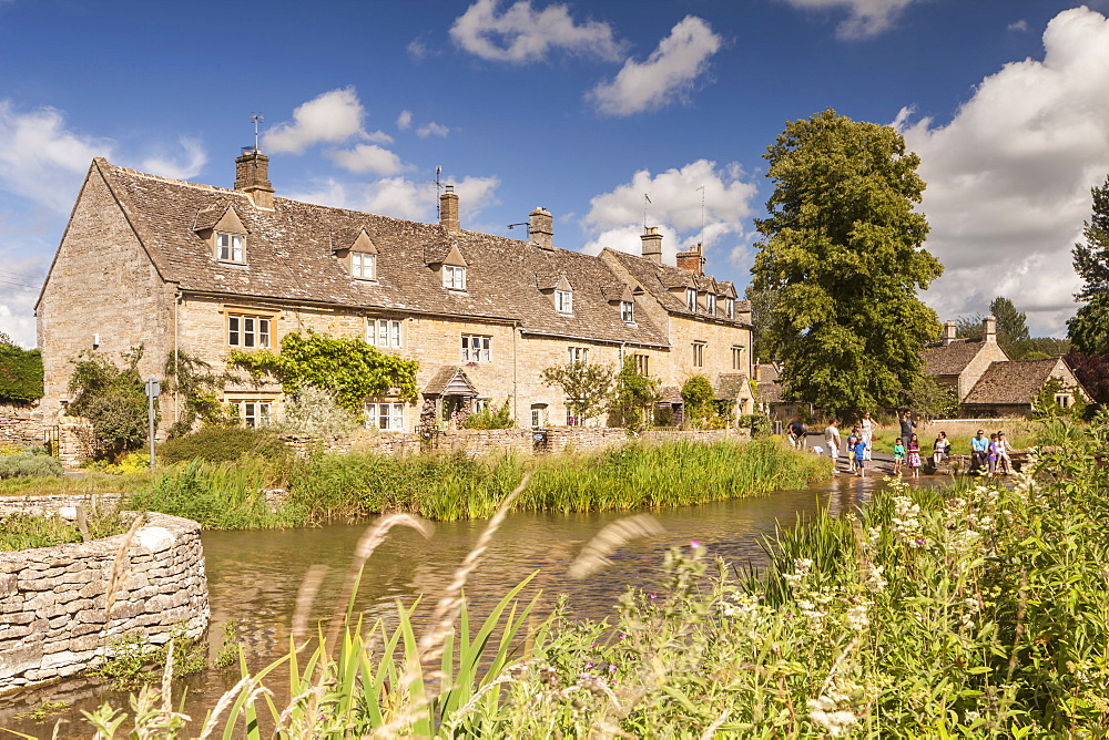 Typical Cotswolds stone houses in Lower Slaughter, Gloucestershire, England, United Kingdom, Europe