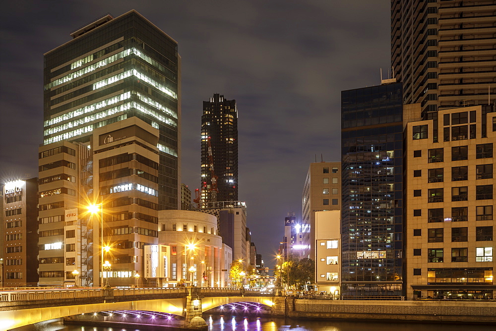 High rise office buildings in the Dotonbori area of Osaka at night, Osaka, Japan, Asia