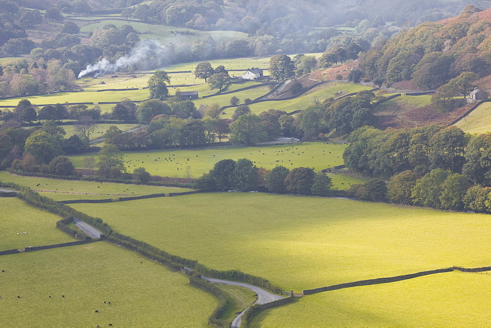 Looking over the patchwork fields of Eskdale in the Lake District National Park, Cumbria, England, United Kingdom, Europe