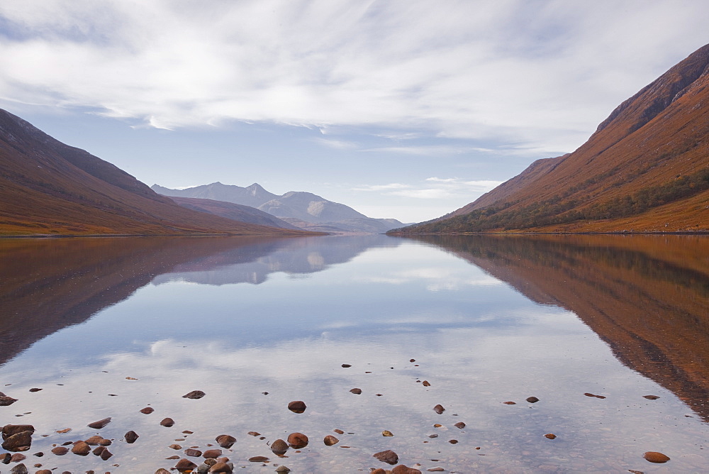 The waters of Loch Etive reflecting the surrounding mountains, Argyll and Bute, Scotland, United Kingdom, Europe