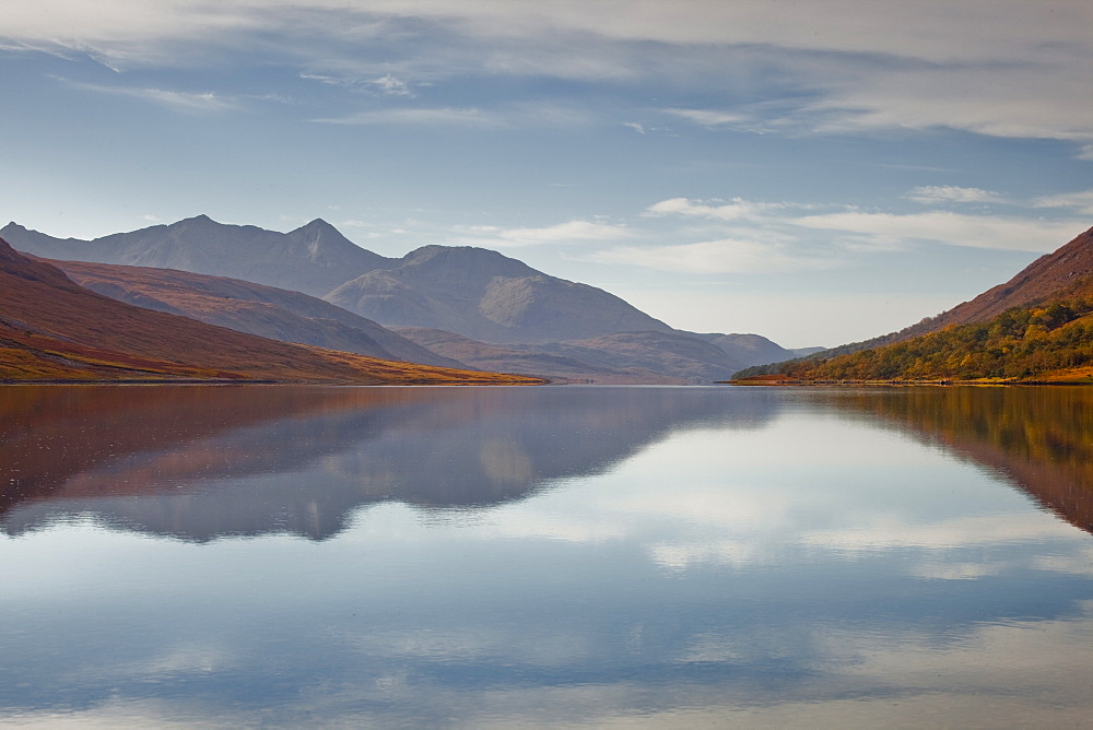 The waters of Loch Etive reflecting the surrounding mountains, Argyll and Bute, Scotland, United Kingdom, Europe