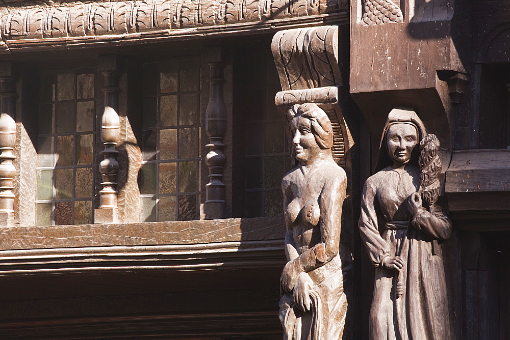 Wooden sculptures adorn a half-timbered house in Angers, Maine-et-Loire, France, Europe