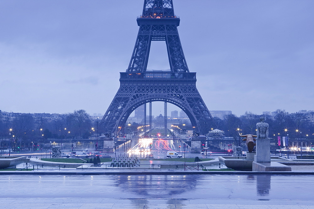 The Eiffel Tower under rain clouds, Paris, France, Europe 