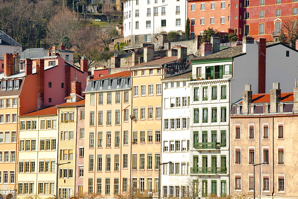 Typical colourful building facades facing onto the River Saone in Lyon, Rhone-Alpes, France, Europe 