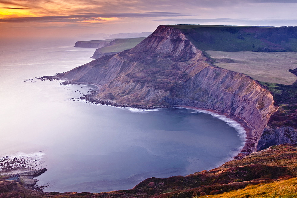 A beautiful sunset over Chapman's Pool on Dorset's Jurassic Coast, UNESCO World Heritage Site, Dorset, England, United Kingdom, Europe