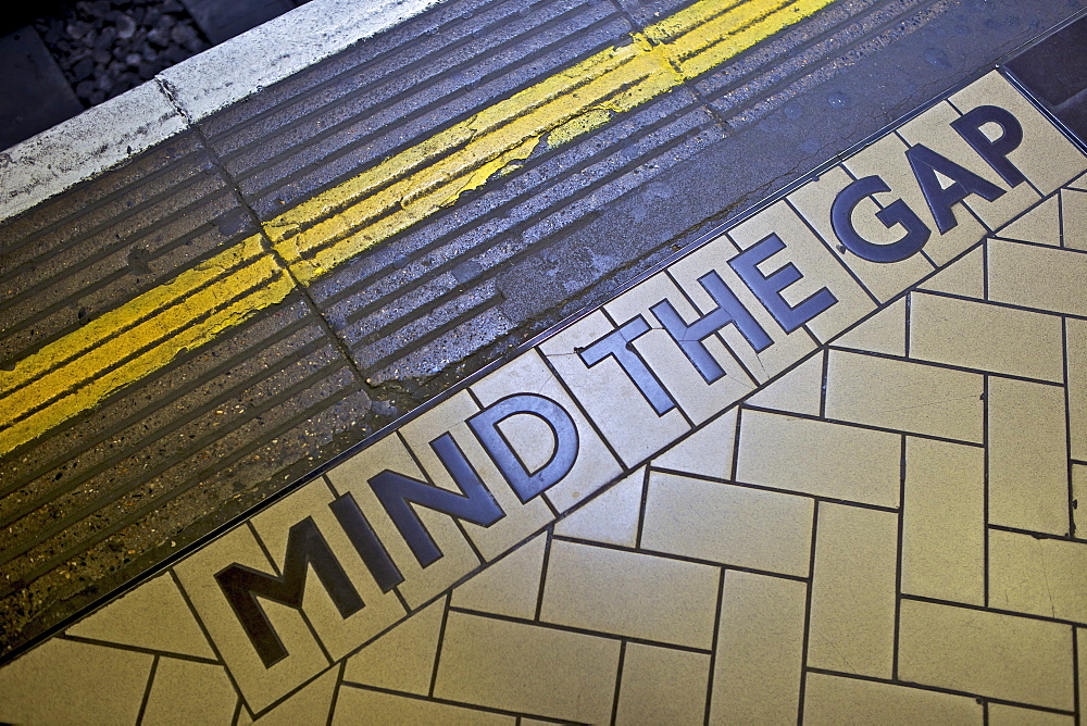 MIND THE GAP sign on platform edge, London Underground, London, England, United Kingdom, Europe