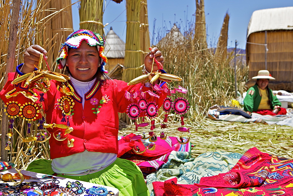 Portrait of a Uros Indian woman selling souvenirs, Islas Flotantes (Floating Islands), Lake Titicaca, Peru, South America