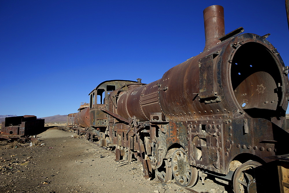 Rusting locomotive at train graveyard, Uyuni, Bolivia, South America