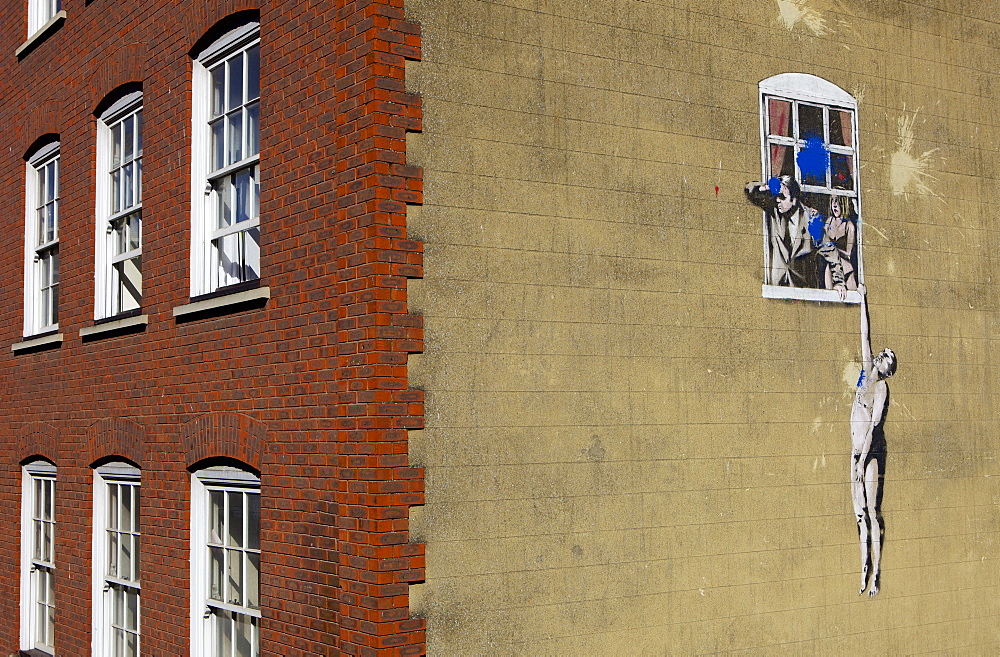 Adultery street art by the graffiti artist Banksy on Park Street in Bristol, England, United Kingdom, Europe