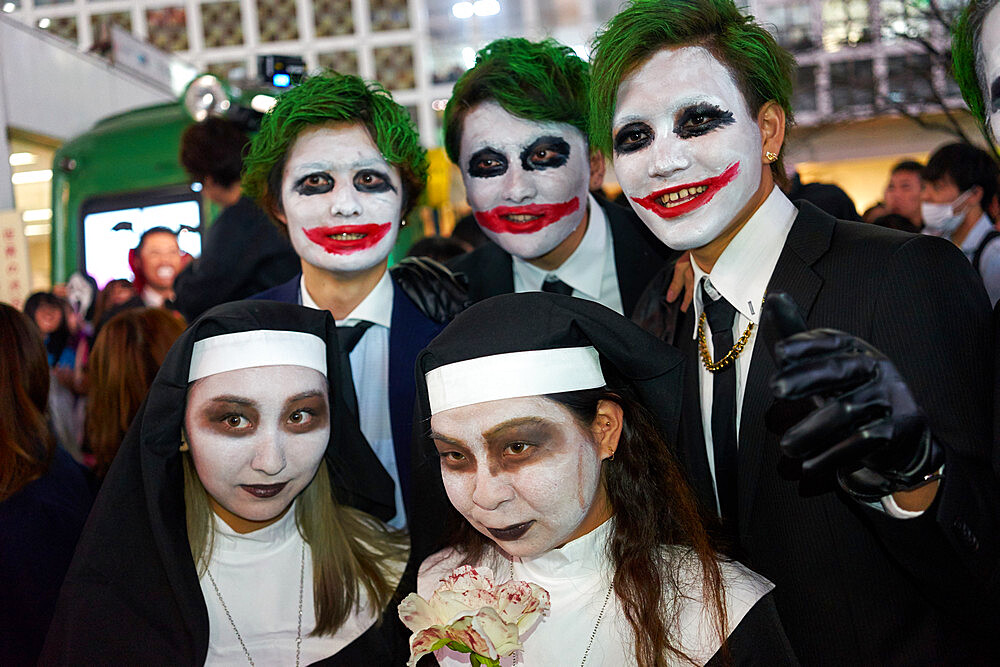 Nuns and jokers at the Halloween celebrations in Shibuya, Tokyo, Japan, Asia