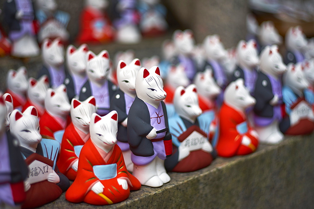 Small fox figurines as marriage votives, Fushimi Inari shrine, Kyoto, Japan, Asia