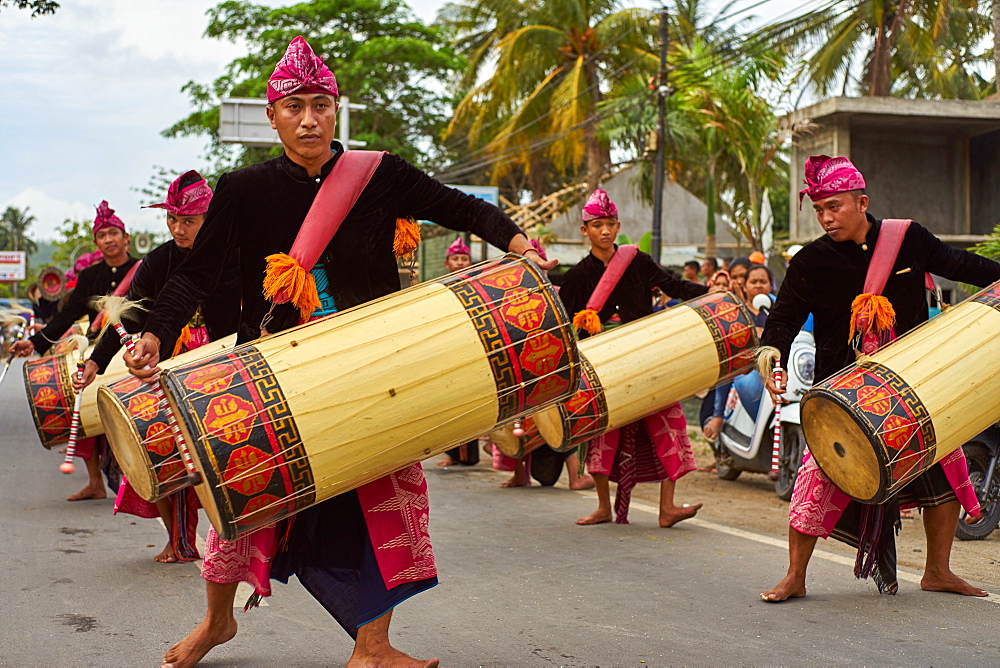 Drummers leading a traditional Sasak wedding procession, Lombok, Indonesia, Southeast Asia, Asia