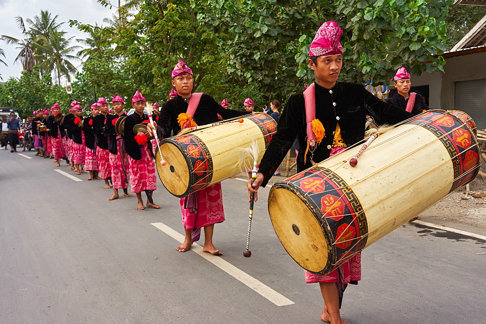 Drummers leading a traditional Sasak wedding procession, Lombok, Indonesia, Southeast Asia, Asia