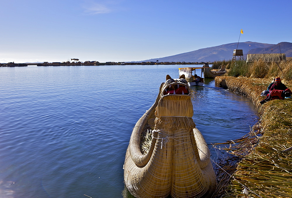 Floating islands of the Uros people, traditional reed boats and reed houses, Lake Titicaca, peru, peruvian, south america, south american, latin america, latin american South America