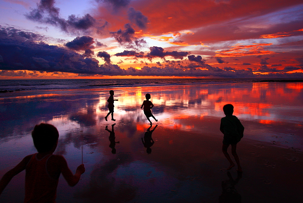 Children play at the Saint Martinâ€™s Island, locally known as Narkel Jinjira,  Bangladesh