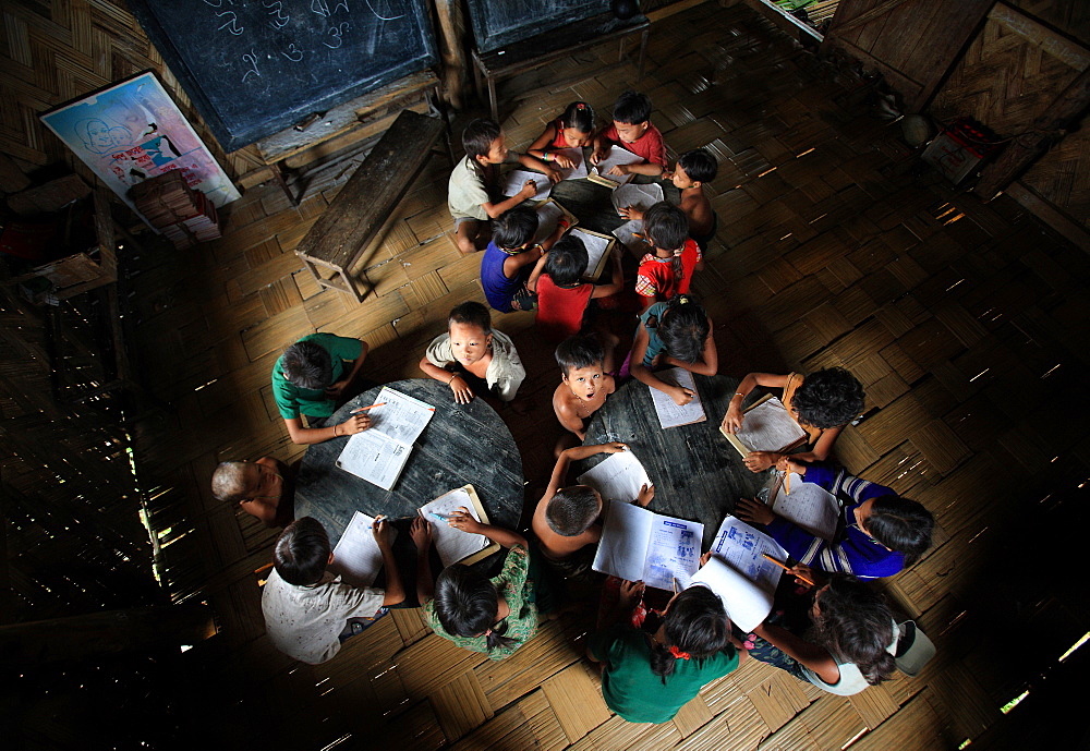 Children are study at morning in the orphanage cum primary school, Bandarban, Bangladesh