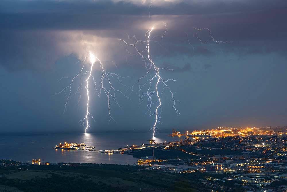 Two branching lightning strikes in Trieste (Italy). Two lightning strikes branched to Trieste, during the very electric storm of August 25, 2018