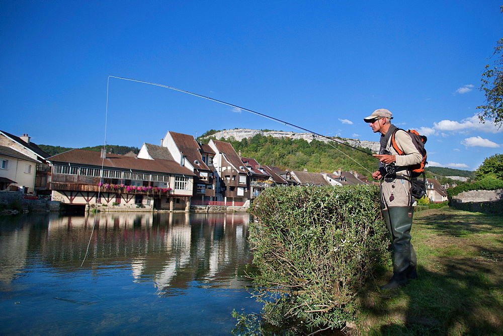 Fly fishing on the Loue river, Ornans, Doubs, Franche-Comté, France