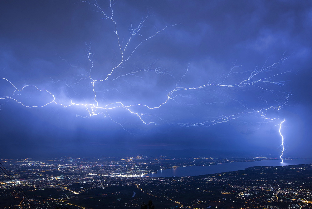 Lightning runing in the sky and impact near Saint-Julien en Genevois during the thunderstorm of the 2019, 25th july 2