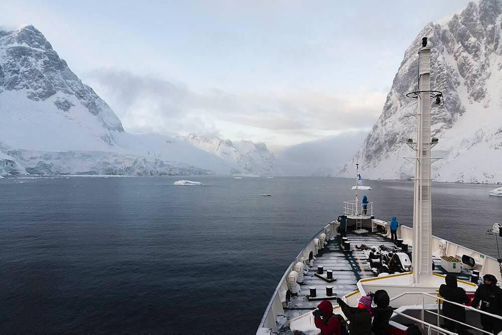 Plancius cruise ship in the Lemaire channel, Antarctica.