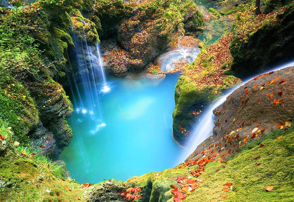 Waterfalls on the Urederra river in autumn, Navarra, Spain