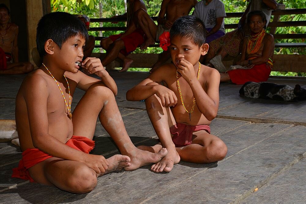 Mentawai boys eating, Siberut, Mentawai, Indonesia