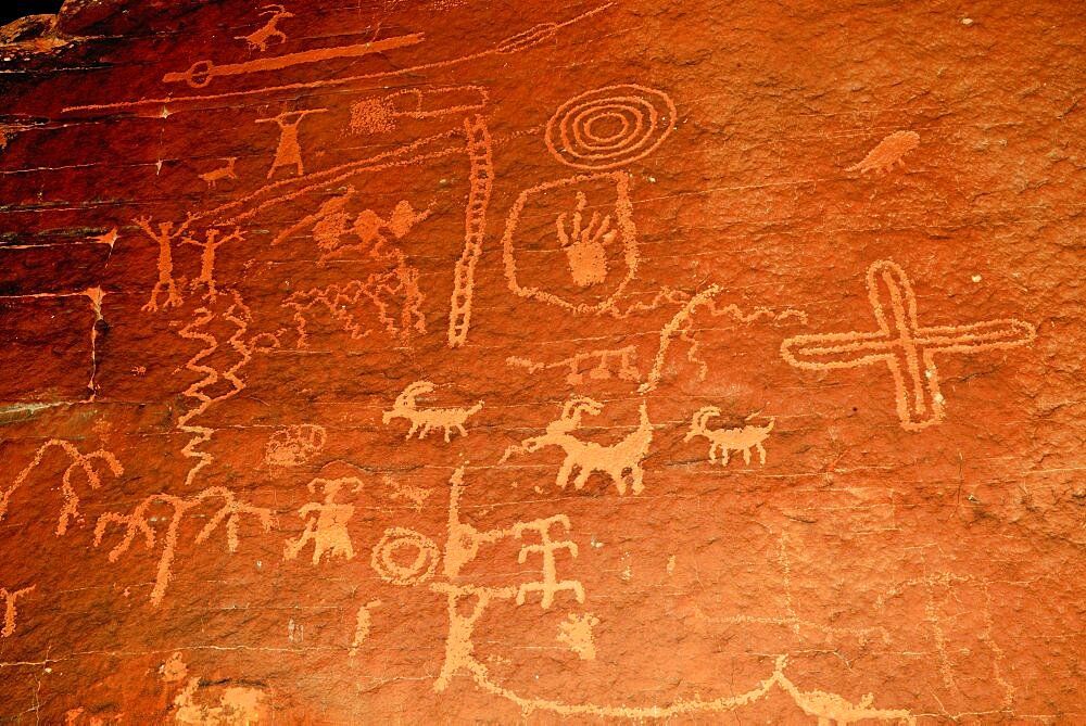 Petroglyphs. With a "Atlal" (Spear-thrower) Probably "Gypsum people". between 2000B.C. -200A.D. Valley of fire Nevada.