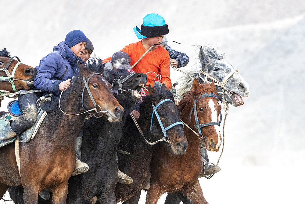 Riders at a game of Kok-boru (or Ulak-tartish or Buzkachi), Central Asian equestrian games at the Noorus festival, Kotchkor, Naryn Region, Kyrgyzstan