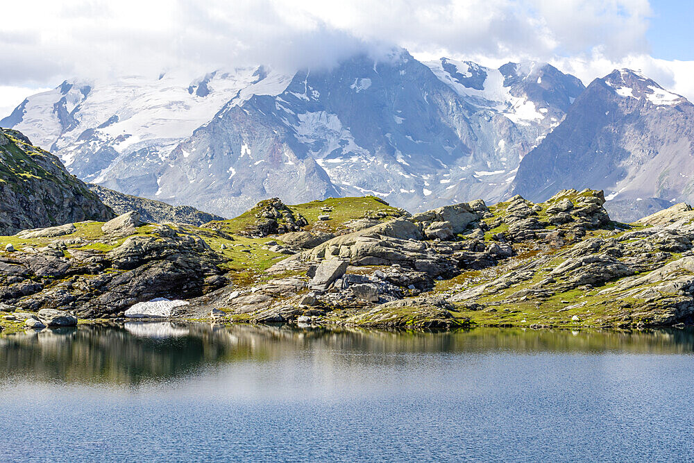 View over Lac du Retour with Mont Pourri in the background, Montvalezan, Haute-Tarentaise, Savoie, France