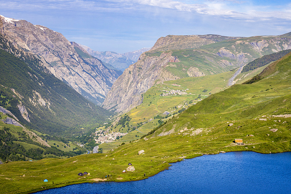 Lac du Pontet (1955 m) with La Grave (Les Plus Beaux Villages de France) in the background and Les Terrasses hamlet (1767 m), upper Romanche valley, Villar-d'Arene, Hautes-Alpes, France