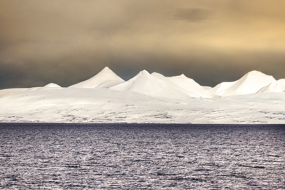 Landscape of Svalbard in Norway, also known as Spitsbergen. This territory stretches from latitude 75 to 80 degrees to the pack ice a few hundred kilometers from the North Pole. Melting ice, early global warming.