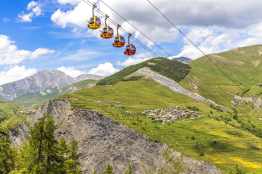 Meije glacier lift (1450 - 3200m) with Les Terrasses in the background, one of the four hamlets of La Grave, upper Romanche valley, Hautes-Alpes, France