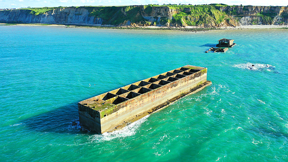 Part of the Mulberry artificial harbour opposite the Cap Manvieu nature reserve on the Gold Beach site in Calvados, Normandy, France