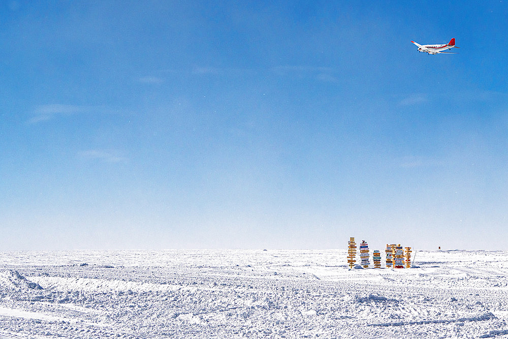 A few weeks after the start of the summer campaign, the winterers who have just spent 14 months at Concordia return home. They take off from Concordia station aboard the Basler;photo), bound for Mario Zucchelli or Dumont d'Urville. Most of them make a sign indicating the village or town where they live, and the distance to Concordia. Concordia Antarctic Base