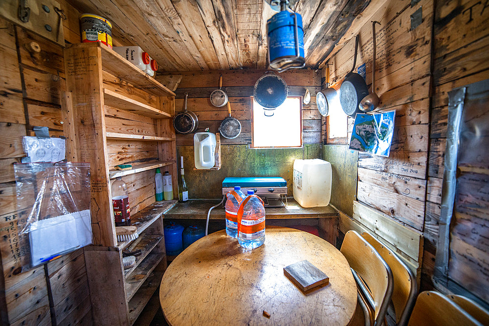 The kitchen, before renovation. The interior of the phonolite hut before renovation work. Kerguelen Islands