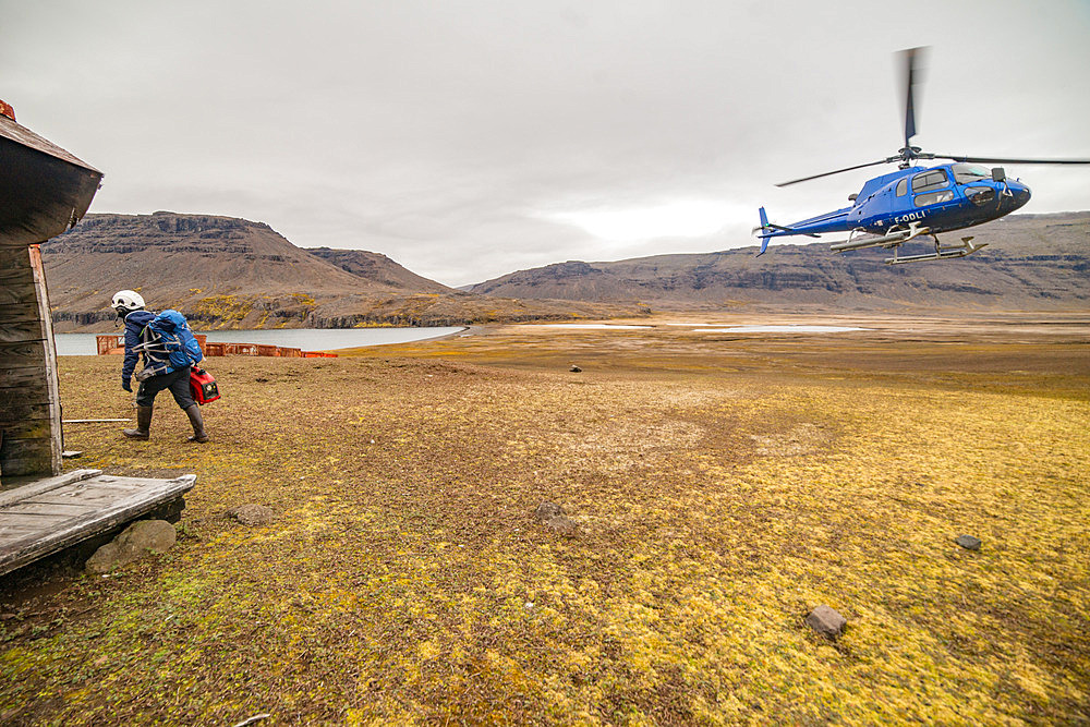 The helicopter has just dropped off a team at the Val Studer hut, with equipment for a renovation project. Kerguelen Archipelago