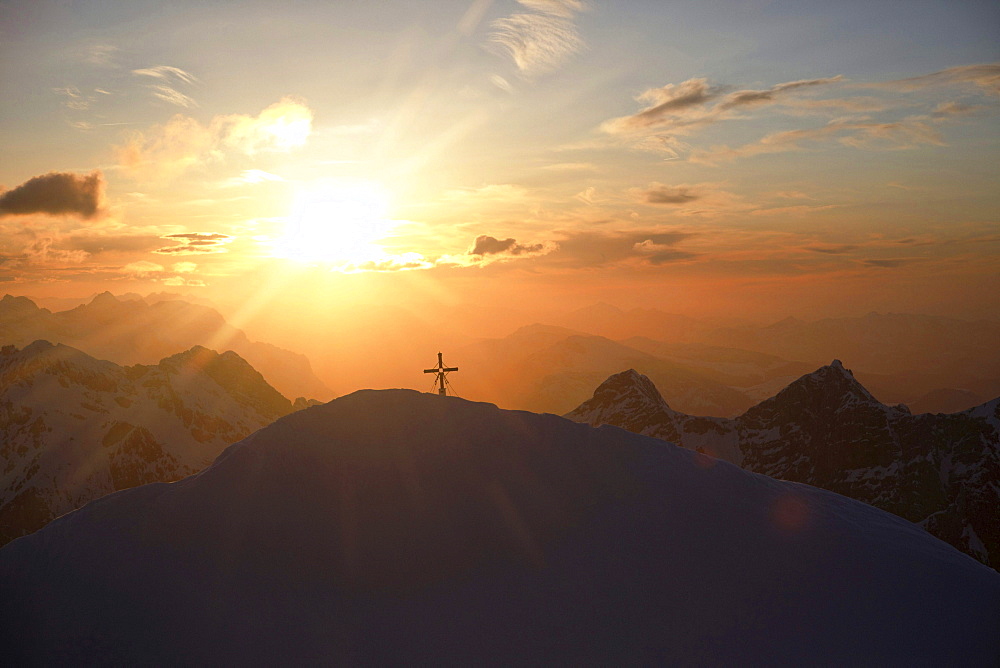 mount Watzmann 2713 m snow covered peak with summit cross at sunset mood Berchtesgaden Berchtesgadener Alpen Oberbayern Bayern Deutschland