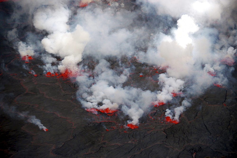 volcano Nyiragongo crater with lava fountains in the lava lake rising smoke nature natural phenomenon Kongo Afrika