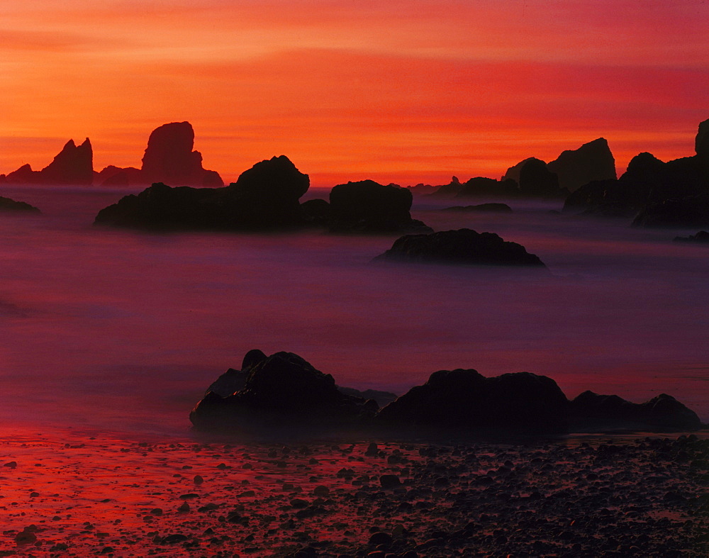 sunset light on surf at Crescent Beach USA  